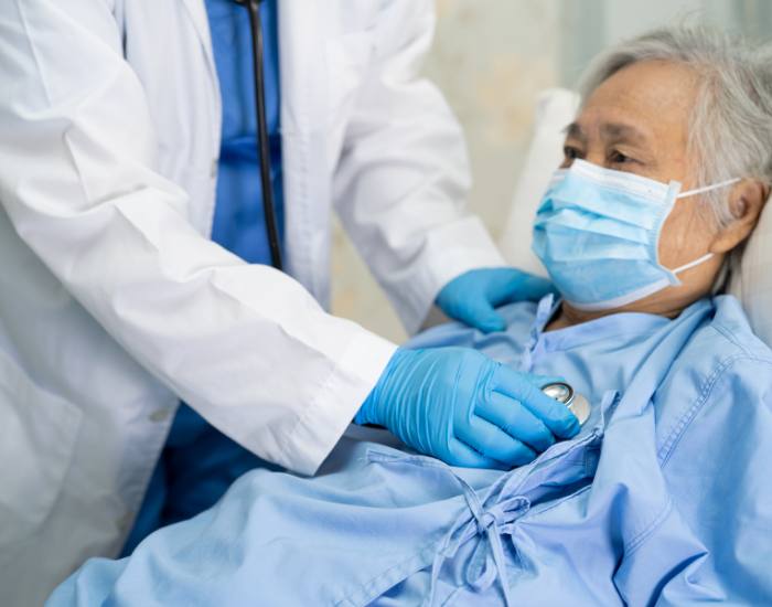 geriatrician is providing care to elderly.